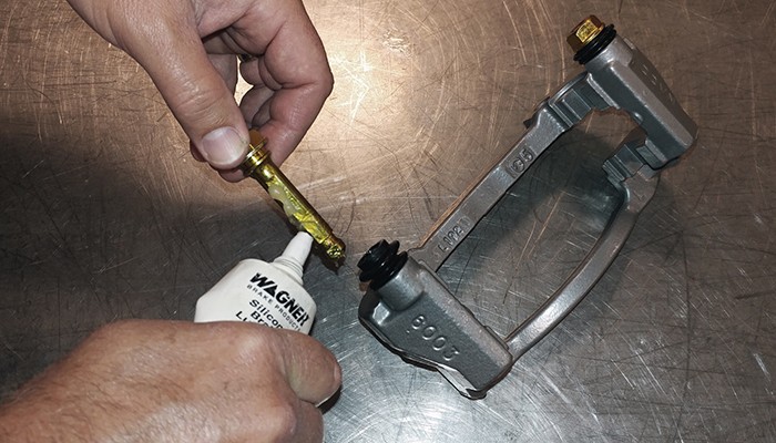 Lubricating-Brake-Pad-Guide-Pins Lubricating-Brake-Pad-Guide-Pins